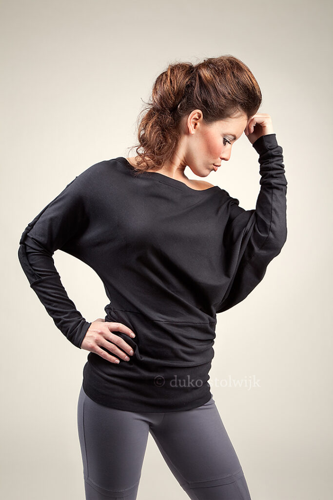Model wearing a dark gray sweater