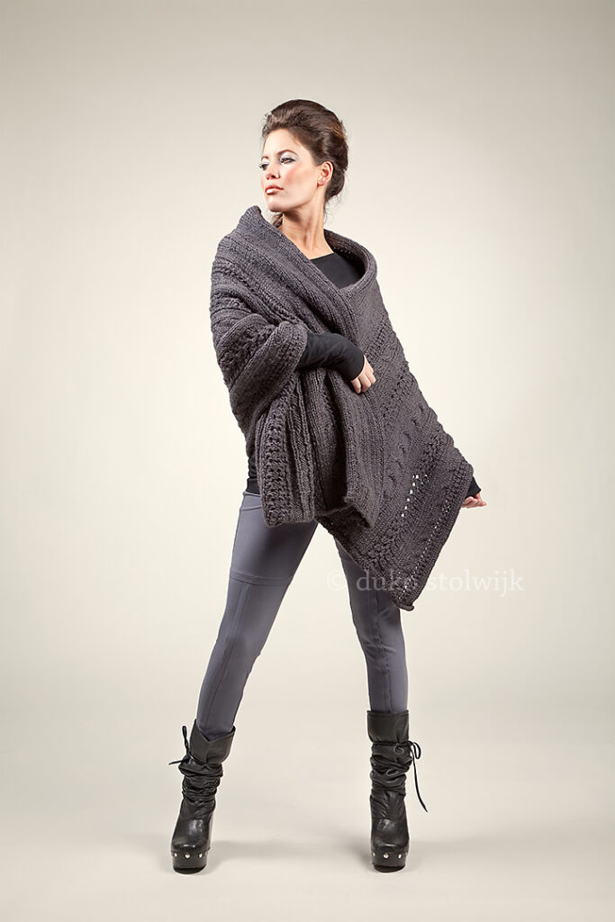 Model wearing a dark gray shawl  by MOKO